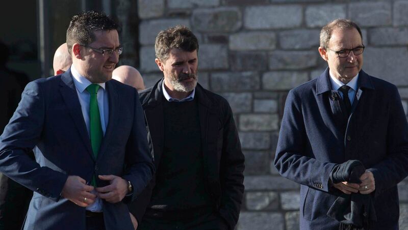 Roy Keane (centre) and Martin O’Neill (right) arrive for the funeral of former Celtic and Manchester United footballer Liam Miller, at St John the Baptist Church in Ovens, Co Cork. Photograph: Clare Keogh/PA Wire