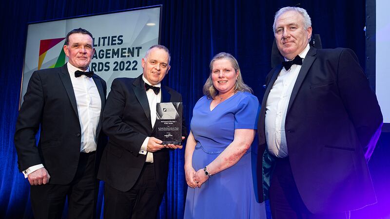 Des Mahon, Director, Authenticate, presents the FM Project of the Year – Public Sector Award to the Office of Government Procurement team.
