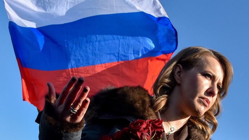 Russian presidential candidate Kseniya Sobchak speaks in central Moscow on Tuesday, at the site where late opposition leader Boris Nemtsov was fatally shot on a bridge near the Kremlin.  Photograph: Vasily Maximov/AFP/Getty Images