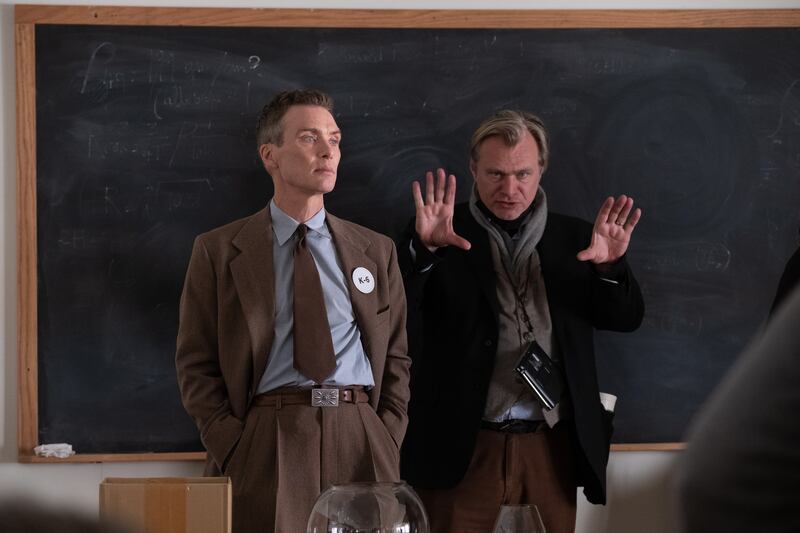 Cillian Murphy (as J Robert Oppenheimer) and writer, director, and producer Christopher Nolan on the set of Oppenheimer. Photograph: Melinda Sue Gordon/Universal Pictures