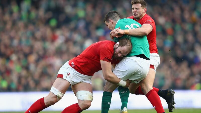 Alun Wyn Jones tackles Johnny Sexton at the Aviva. Photograph: Julian Finney/Getty