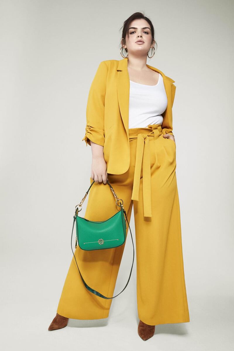 Blazer (€80), trousers (€60), and bag (€40) from River Island