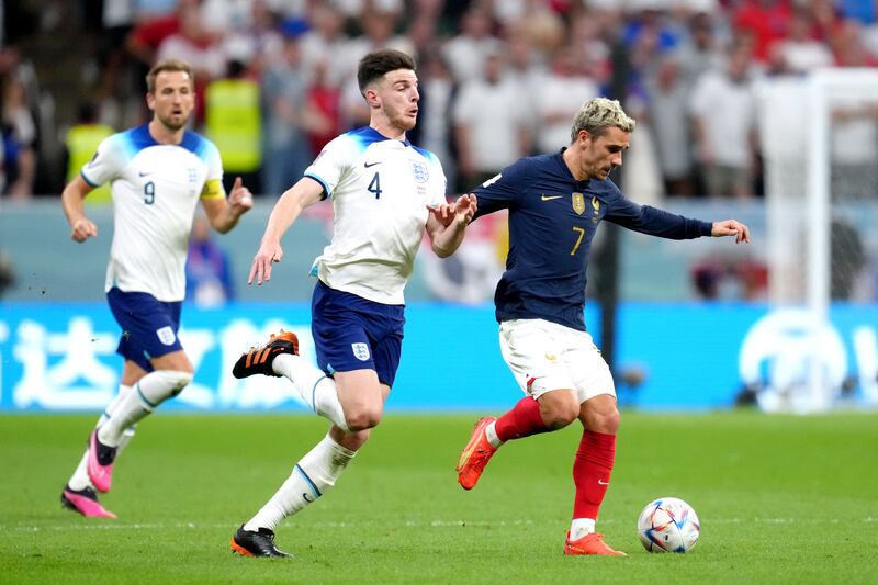 France's Antoine Griezmann holds off the challenge of England's Declan Rice in the World Cup. Photograph: Nick Potts/PA
