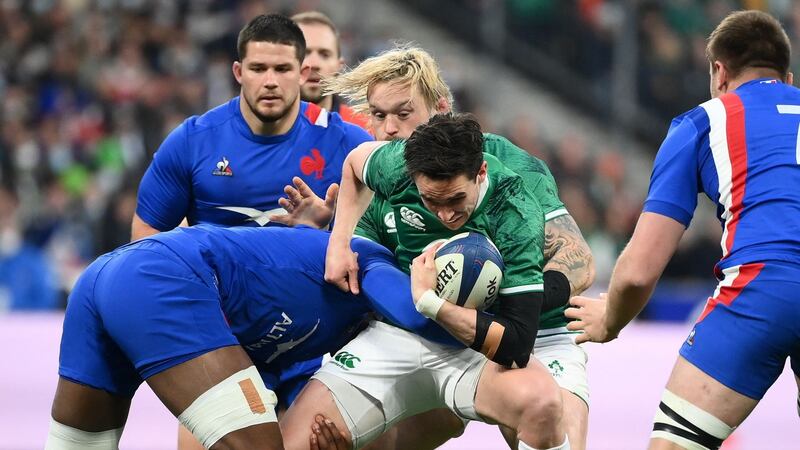Joey Carbery is tackled by French lock Cameron Woki during the Six Nations match in Paris. Photograph: Franck Fife/AFP via Getty Images