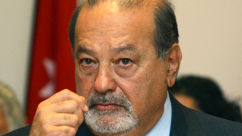Mexican telecoms tycoon Carlos Slim is one of  the 62 individuals who are now worth the same amount  as the poorest half of the global population.