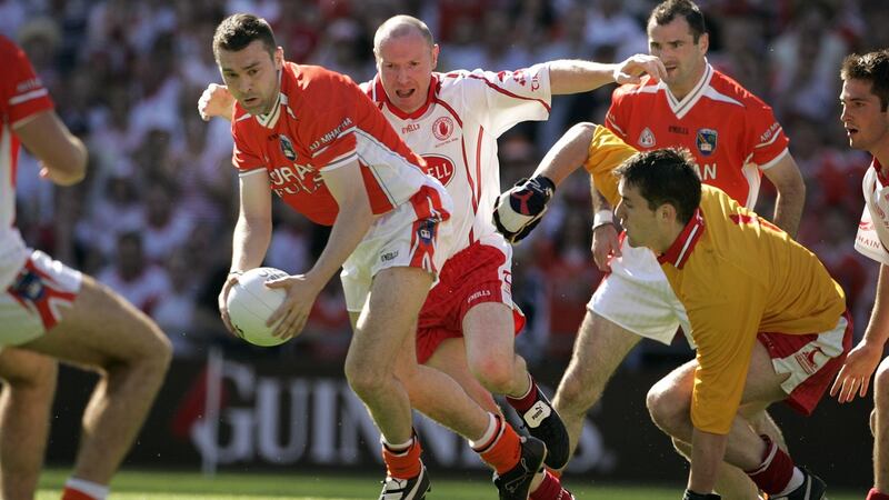 Oisín McConville, Armagh, in action against Tyrone during  the Ulster final at Croke Park  in 2005. The Ulster final was moved to headquarters three years in a row between  2004 and ’06.  Photograph: Dara Mac Dónaill