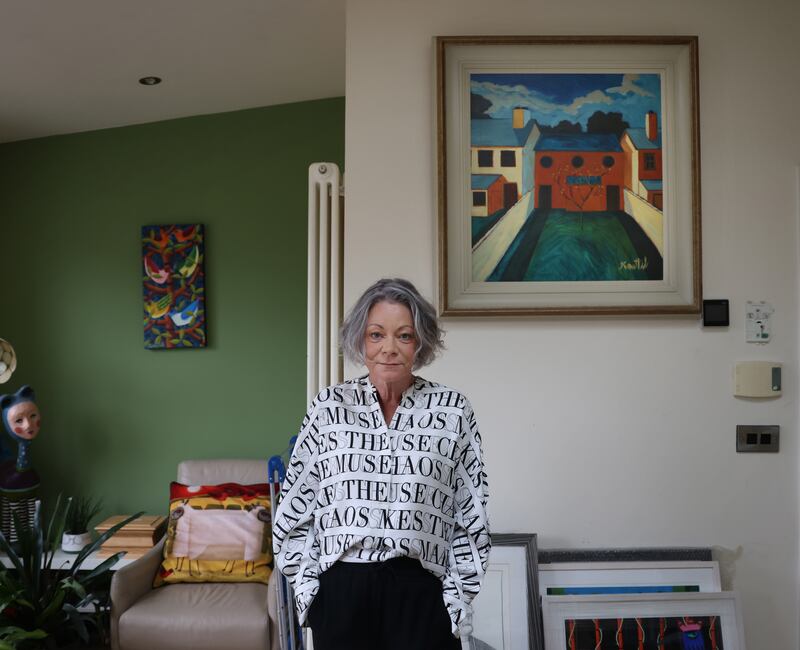 Ruth Mathers at home with the artwork of her husband the artist Graham Knuttel, who died two years ago.  Photo: Bryan O’Brien