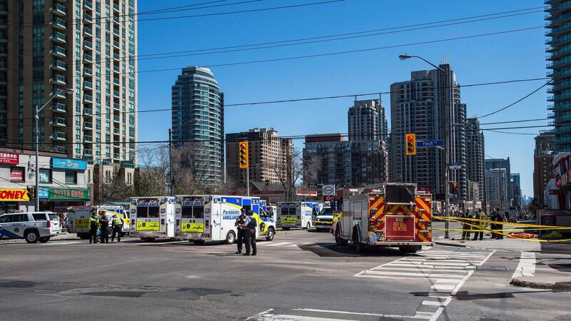 Emergency services close Yonge Street in Toronto after a van drove  into a crowd of pedestrians. Photograph: Aaron Vincent Elkaim/The Canadian Press via AP