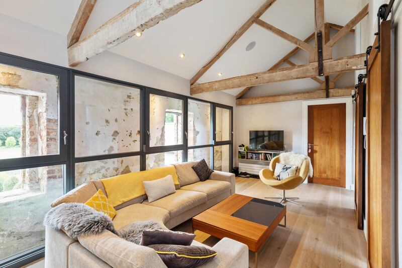 The coach house has a house within a house, showing original exterior walls