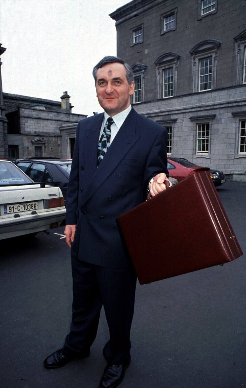 1992: Bertie Ahern on Ash Wednesday holding up his budget day bag. Photograph: RollingNews.ie