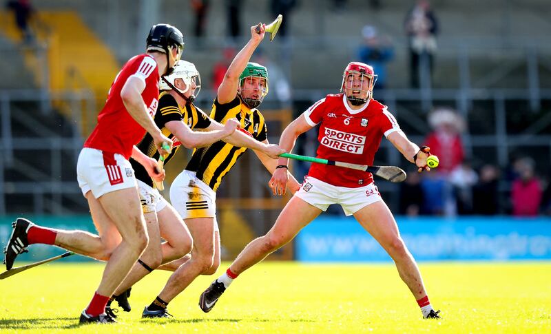 Kilkenny’s Alan Murphy and Ciarán Joyce of Cork in action during Sunday's league encounter. Photograph: Ryan Byrne/Inpho