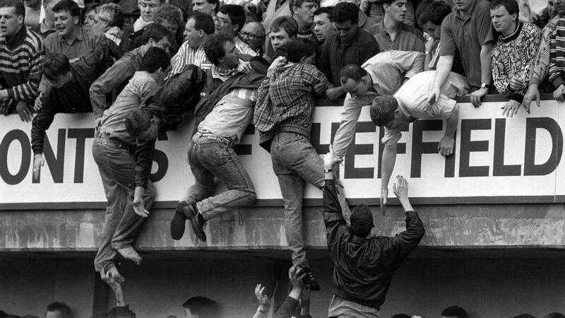 Liverpool fans trying to escape severe overcrowding during the FA Cup semi-final football match between Liverpool and Nottingham Forest. Photograph: David Giles/PA Wire
