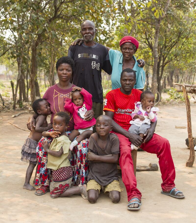 The family of Moses and Lydia Mwape, including the grandparents of twins Bupe and Mapalo, in the remote village of Chabatama in the Kawambwa region of Zambia. Photograph: Blaine Rennicks