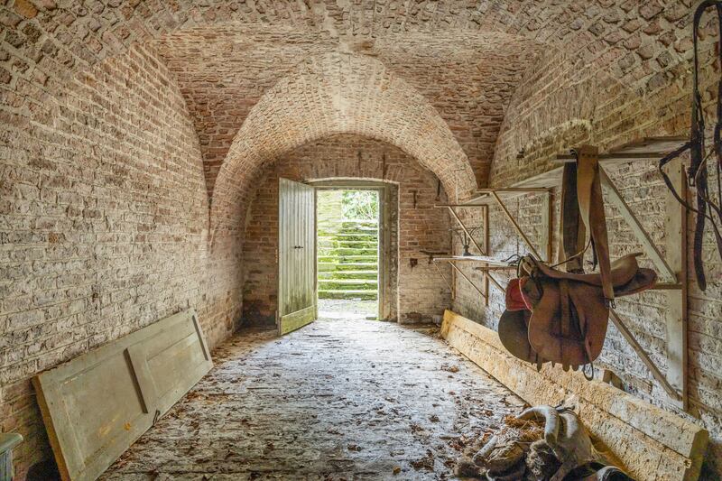 The brick-vaulted basement 