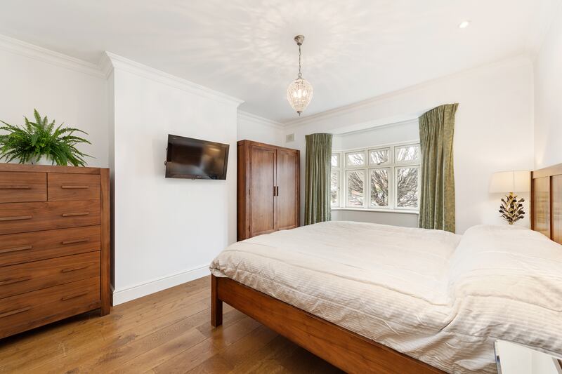 Bedrooms include the spacious principal overlooking the back garden, a further double to the front and a large single with generous storage.