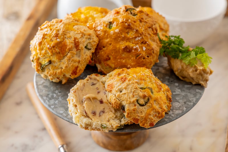Savoury jalapeño and smoked cheese scones with a brown butter bacon spread. Photograph: Harry Weir Photography