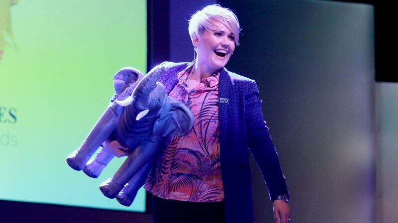Any Conway taking to the stage holding a large inflatable elephant. Photograph Nick Bradshaw