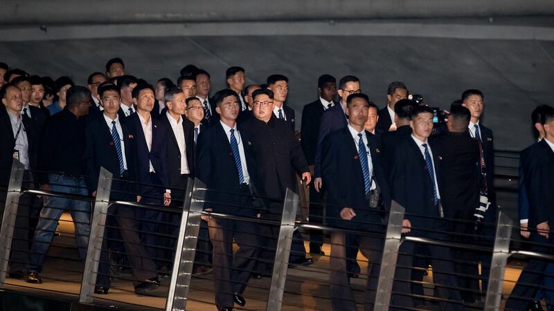 Kim Jong-un, North Korea’s leader, tours the Esplanade in Singapore. Photograph: SeongJoon Cho/Bloomberg