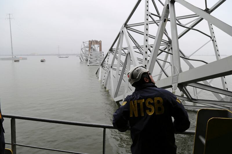 An investigator on the cargo vessel Dali in Baltimore, Maryland. Photograph: Peter Knudson/AP