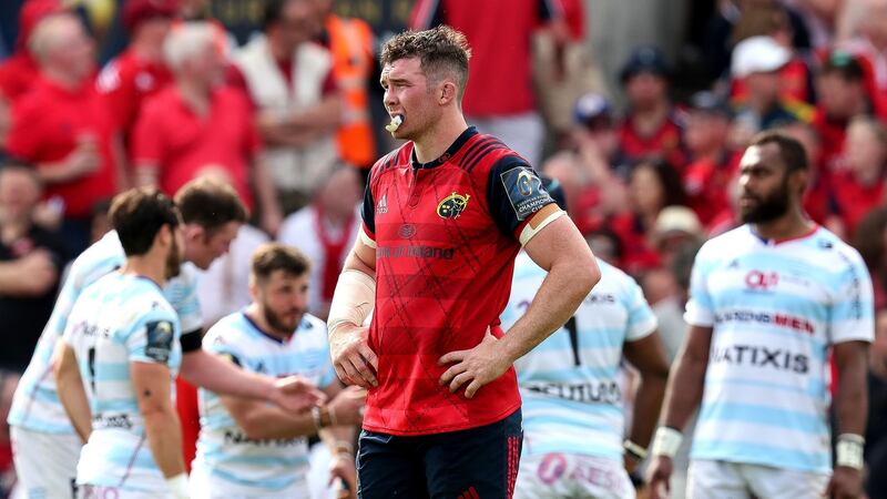 Munster captain Peter O’Mahony looks on as Racing 92 celebrate scoring a try in the Champions Cup semi-final at  Stade Chaban-Delmas. Photograph: Billy Stickland/Inpho