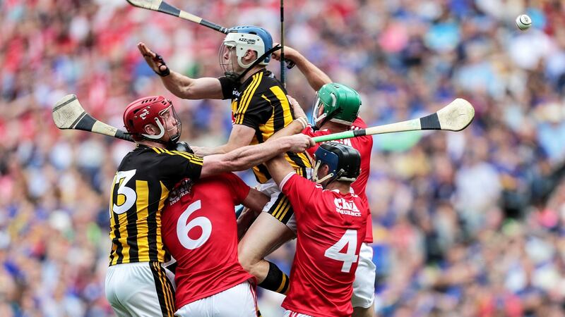 TJ Reid in the thick of the action against Cork. When the need is greatest, the leaders step up. No matter how they are performing up to that point, they hunt the ball down, make something happen.  Photograph: Laszlo Geczo/Inpho