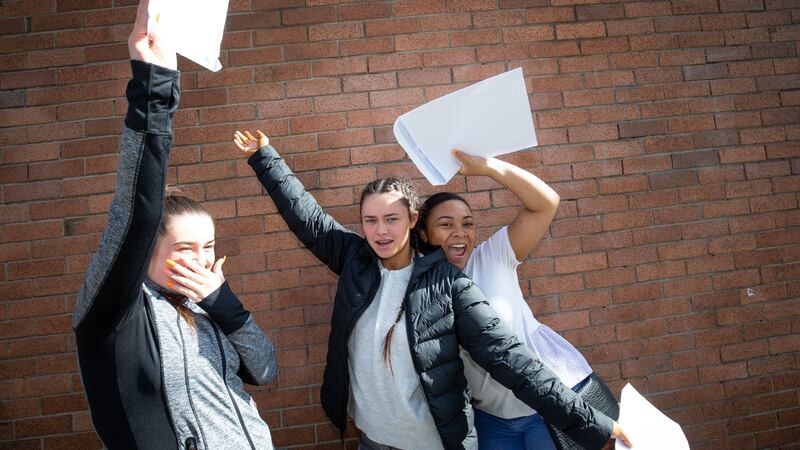 Lauren Cleary, Casey Lawlor Brennan and Sophie Geoghegan after getting their Leaving Cert results. Photograph: Tom Honan/The Irish Times.