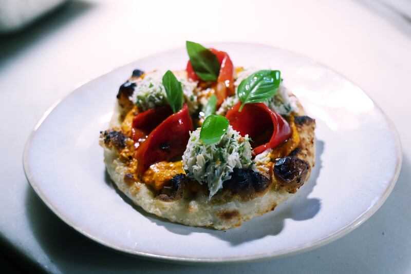 Crab flatbread, romesco and marinated red pepper
