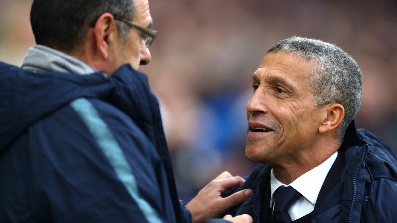 Brighton manager Chris Hughton and Chelsea manager Maurizio Sarri at the Community Stadium. Photograph: Dan Istitene/Getty Images