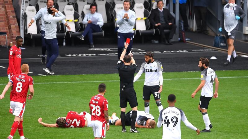 Derby’s Martyn Waghorn is shown a late red card for a tackle on Ryan Yates. Photograph: Laurence Griffiths/Getty