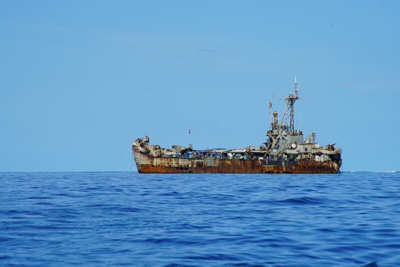 The Sierra Madre, a beached ship that now serves as a Philippine manned outpost on Ayungin shoal in the South China Sea. Photograph:  Camille Elemia/New York Times)
                      