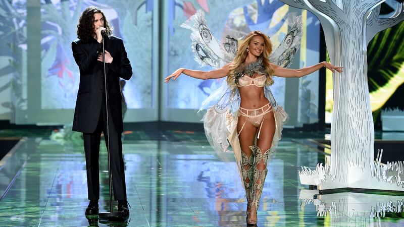 Hozier performing  as model Candice Swanepoel walks the runway during the 2014 Victoria’s Secret fashion show  in London. Photograph: Getty Images
