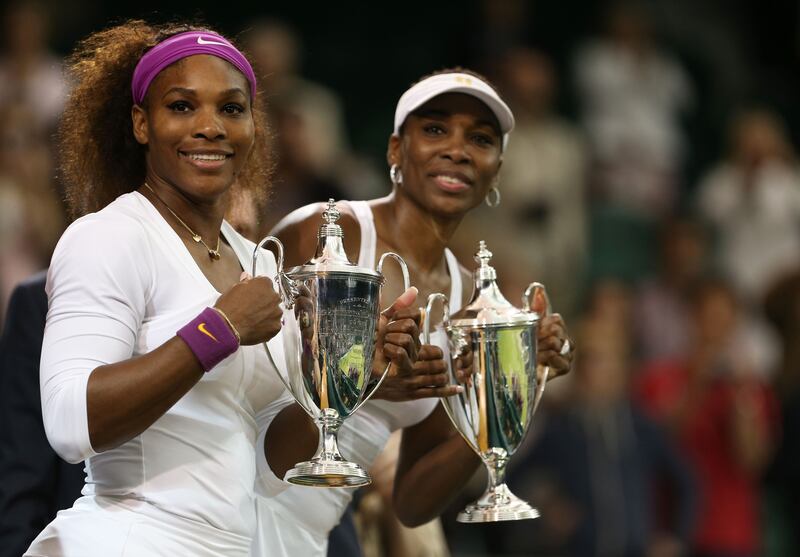 Serena and Venus Williams celebrate after their Ladies’ Doubles final match against Andrea Hlavackova and Lucie Hradecka at Wimbledon on July 7th, 2012. Photograph: Julian Finney/Getty Images