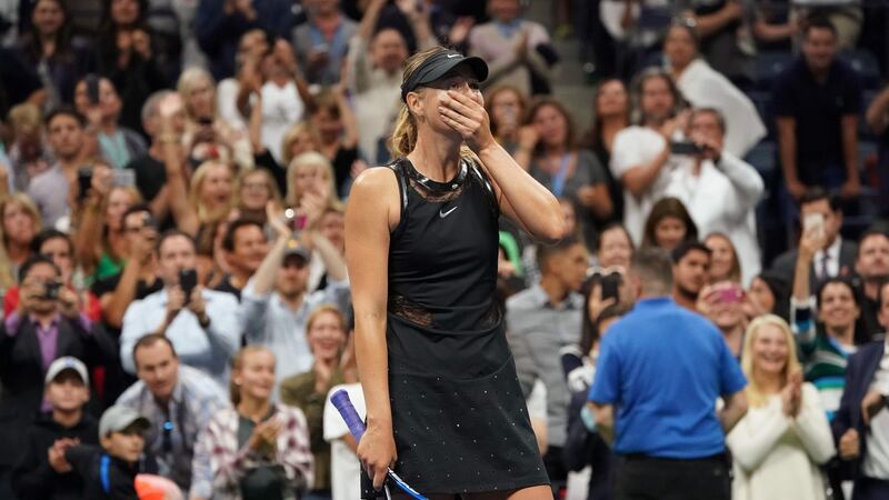 Maria Sharapova reacts after beating Simona Halep in her opening game of the US Open at Flushing Meadows, New York. Photo: Don Emmert/Getty Images