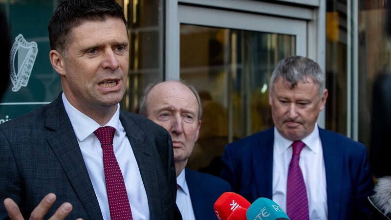 Gary Owens and Shane Ross look on as Niall Quinn speaks in January. Photograph: Morgan Treacy/Inpho