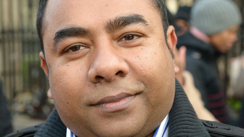 Mostofa Chowdhury, from Bangladesh and living in Ireland for 12 years, was outside the Dáil to mark International Migrants Day. Photograph: Brenda Fitzsimons.