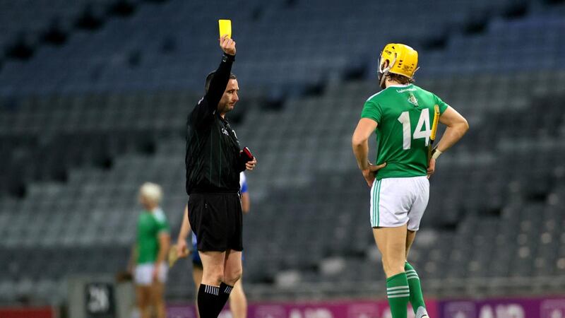 Referee Fergal Horgan gives  Séamus Flanagan of Limerick a yellow card during the  All-Ireland SHC  Final against Waterford at  Croke Park. Photograph:  James Crombie/Inpho