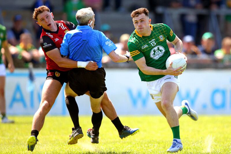 Meath’s Jordan Morris gets away from Down's Pierce Laverty. Photograph: Leah Scholes/Inpho