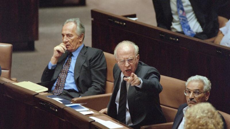Israel’s prime minister Yitzhak Rabin gestures while foreign minister Shimon Peres listens in the Knesset in Jerusalem on October 6th, 1995, weeks before Rabin was assassinated. Photograph: Sven Nackstrand/AFP/Getty Images