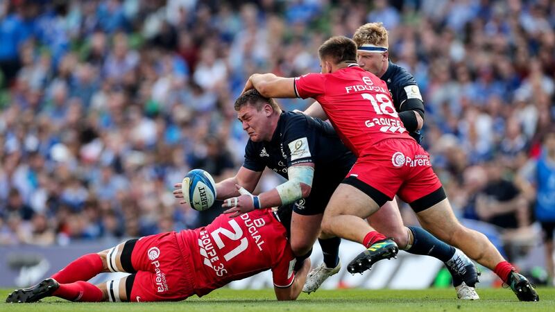 Leinster’s Tadhg Furlong is tackled by Francois Cros and Maks Van Dyk during his side’s win over Toulouse. Photograph: Billy Stickland/Inpho