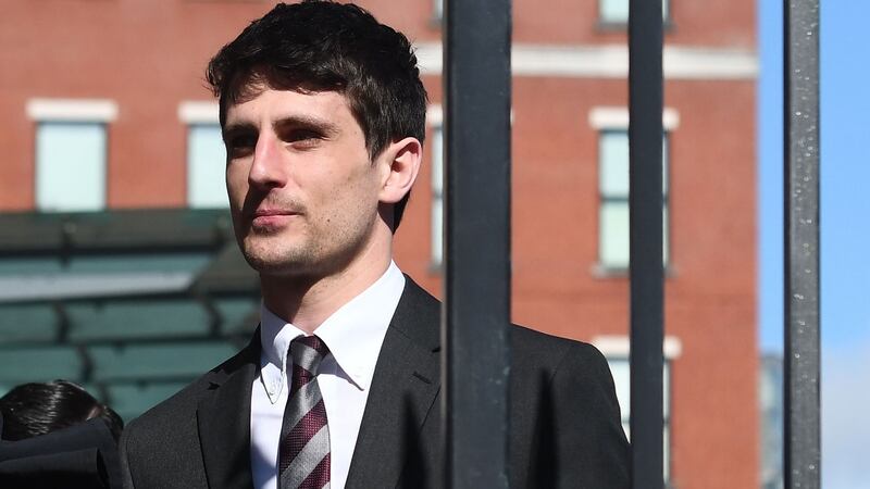 Blane McIlroy leaves Laganside court after he was found not guilty. Photo Pacemaker Press