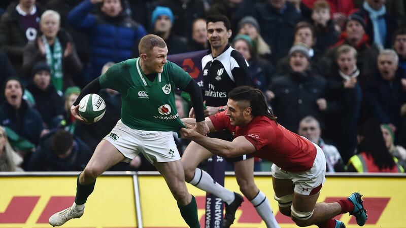 Keith Earls is tackled by Josh Navidi during Ireland’s win over Wales. Photograph: Charles McQuillan/Getty