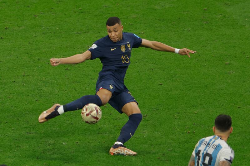 France's forward Kylian Mbappé scores his team's second goal in two minutes to equalise for France and bring the game to extra time. Argentina had seemed to be cruising to the trophy but for a late show from France. Photograph: Odd Andersen/AFP via Getty