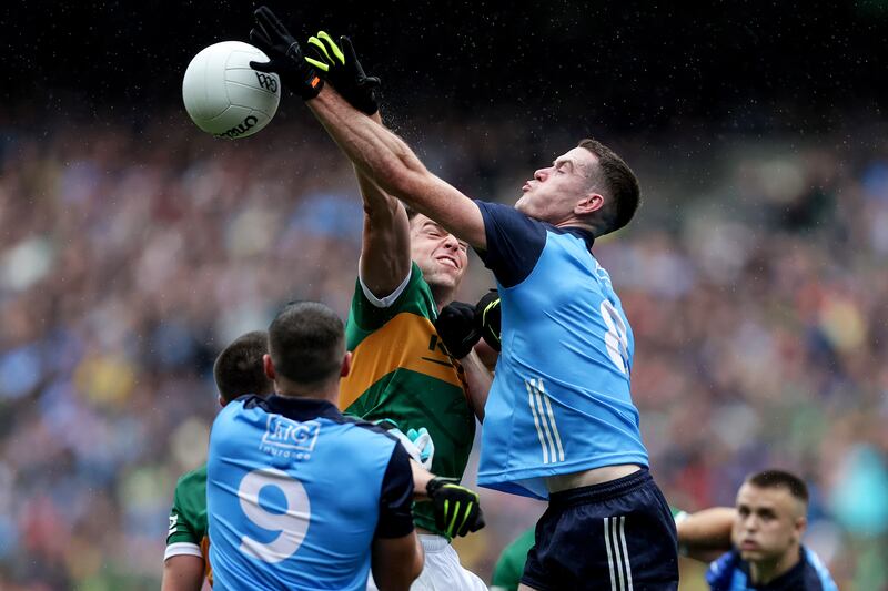Brian Fenton of Dublin challenges Kerry's Jack Barry during the All-Ireland SFC final. Photograph: Laszlo Geczo/Inpho