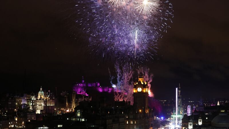 Fireworks light up the sky in Edinburgh during the Hogmanay New Year celebrations. Photograph: PA
