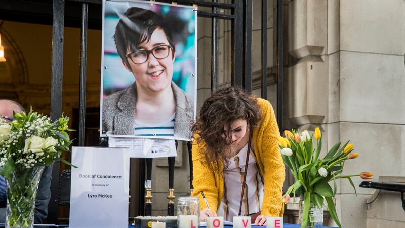 Signing the  book of condolence after a vigil at Belfast City Hall in memory of murdered journalist Lyra McKee. Photograph: Liam McBurney/PA