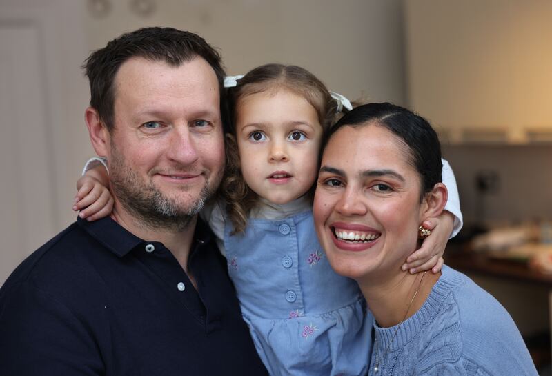 Vilmarys Salgado and her husband, Marius Skripkauskas, with their daughter Mila, age three, at home in Dublin. Photograph: Dara Mac Dónaill