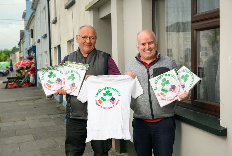 James Hackett, left and Neil Donovan, Ballyporeen Community Council historian, outside the former shop where Neil's parents, Con and Nora Donovan, sold souvenirs including T-shirts and car stickers during Ronald Reagan's visit in 1984. Photograph: Diarmuid Greene
