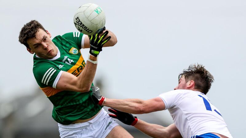 Kerry’s David Clifford competes in the air with Andrew Woods of Monaghan during the Allianz Football League Division One game at Páirc Grattan in Inniskeen. Photograph: Ben Brady/Inpho