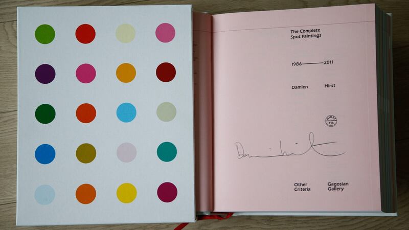 Shaun’s signed copy of Damien Hirst’s The Complete Spot painting’s book. Photograph: Nick Bradshaw