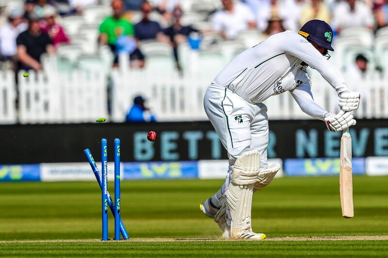Ireland's Graham Hume is bowled by England's Stuart Broad in the Lord's test. Cricket Ireland now finds itself in legal trouble. Photograph: Ben Whitley/Inpho